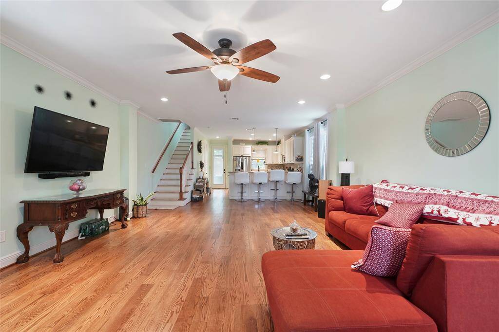 Living Room - View 3 - Offers direct access to the stairs and the open kitchen