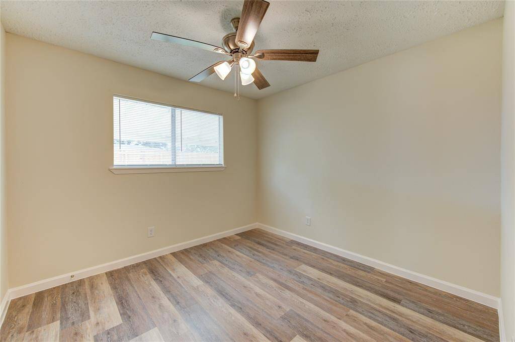 Bedroom 2.  All bedrooms have blinds and new ceiling fans
