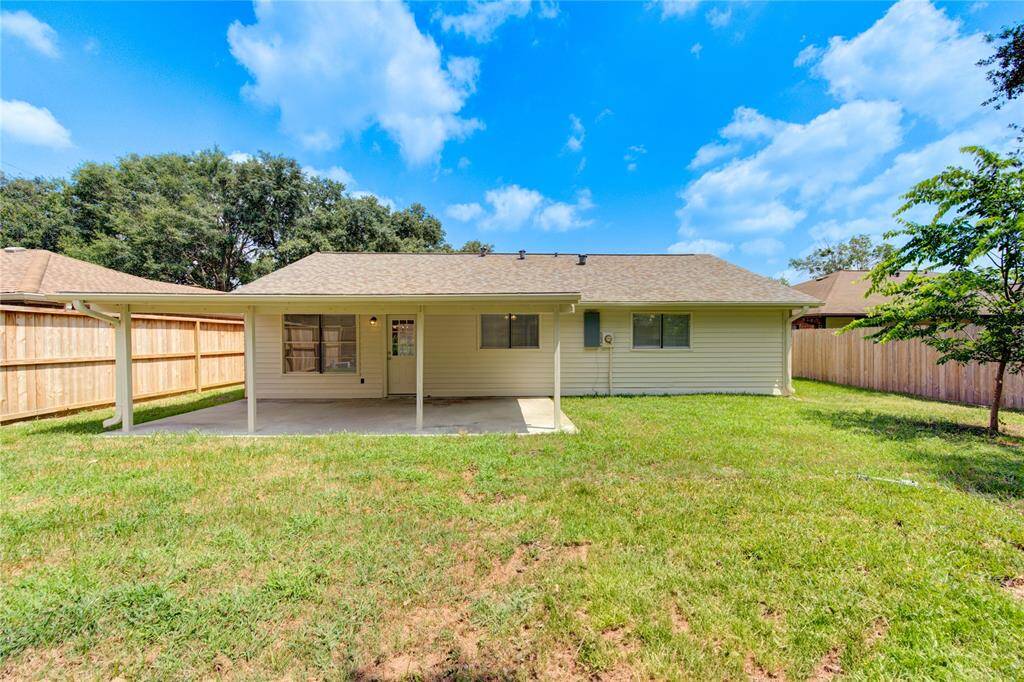 The home has a newer roof, large concreted back patio cover, vinyl siding, a new electric panel, and  fresh paint job!