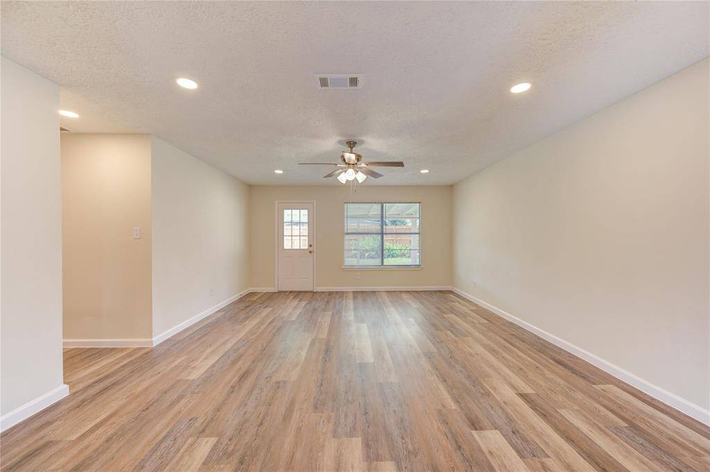 The family room is quite large and can hold large furniture and has 2 walls for a large format TV too!