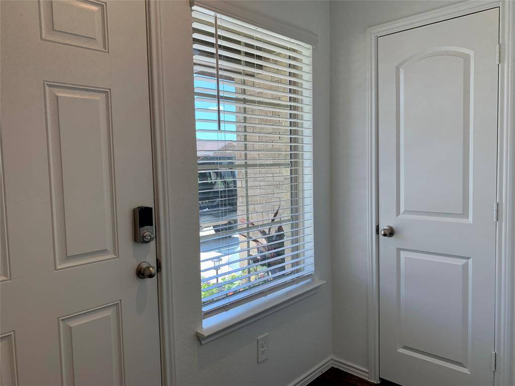 Nice bright entrance with a coat closet