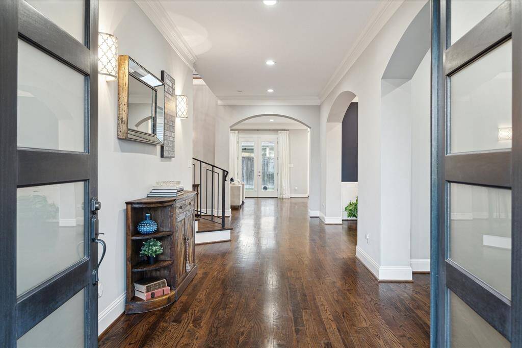 A formal entry opens to the study and formal dining areas and leads to the expansive living area.