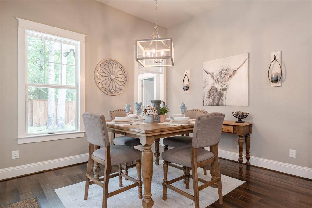 Generously sized breakfast area offers the perfect spot for morning coffee or family meals, right off the kitchen.
