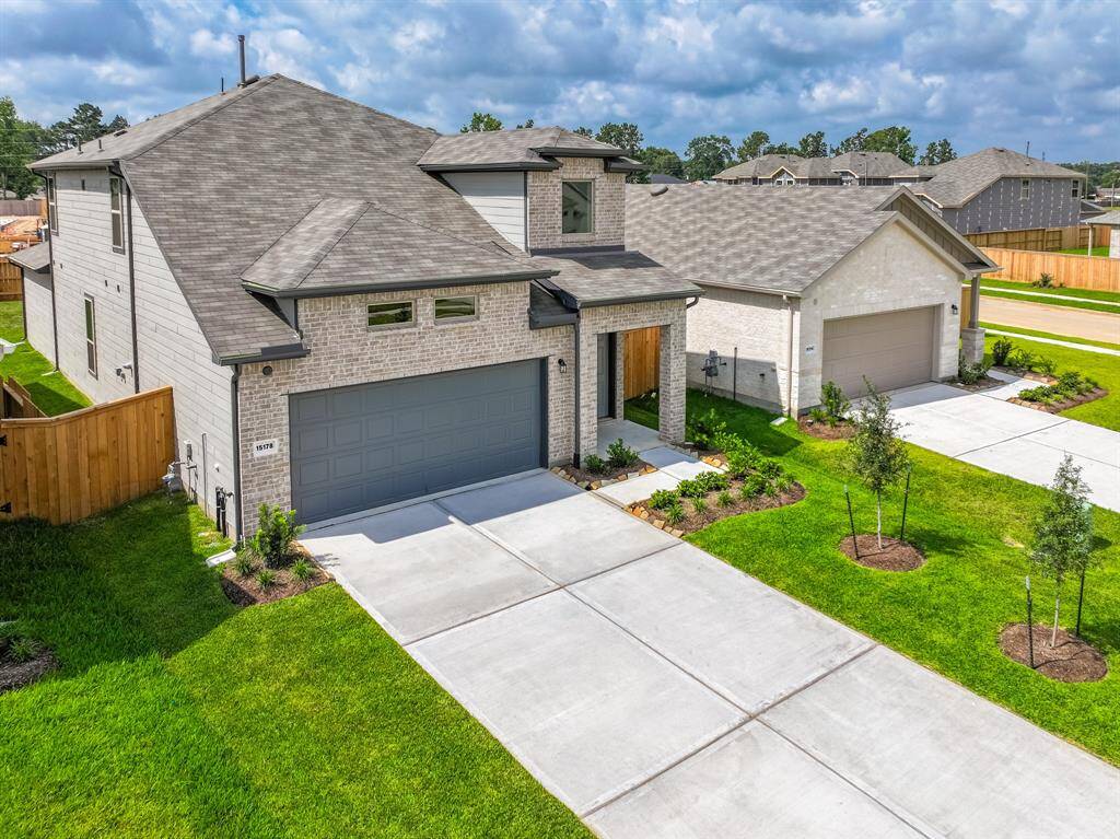 Two-story brick home with modern elevation