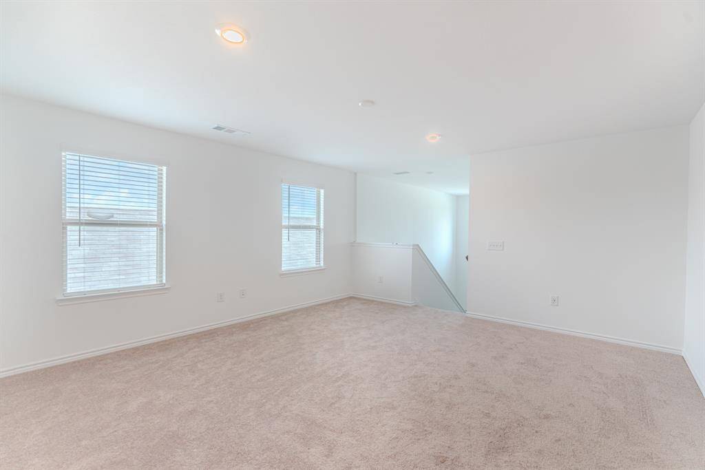 Second floor media room with natural light
