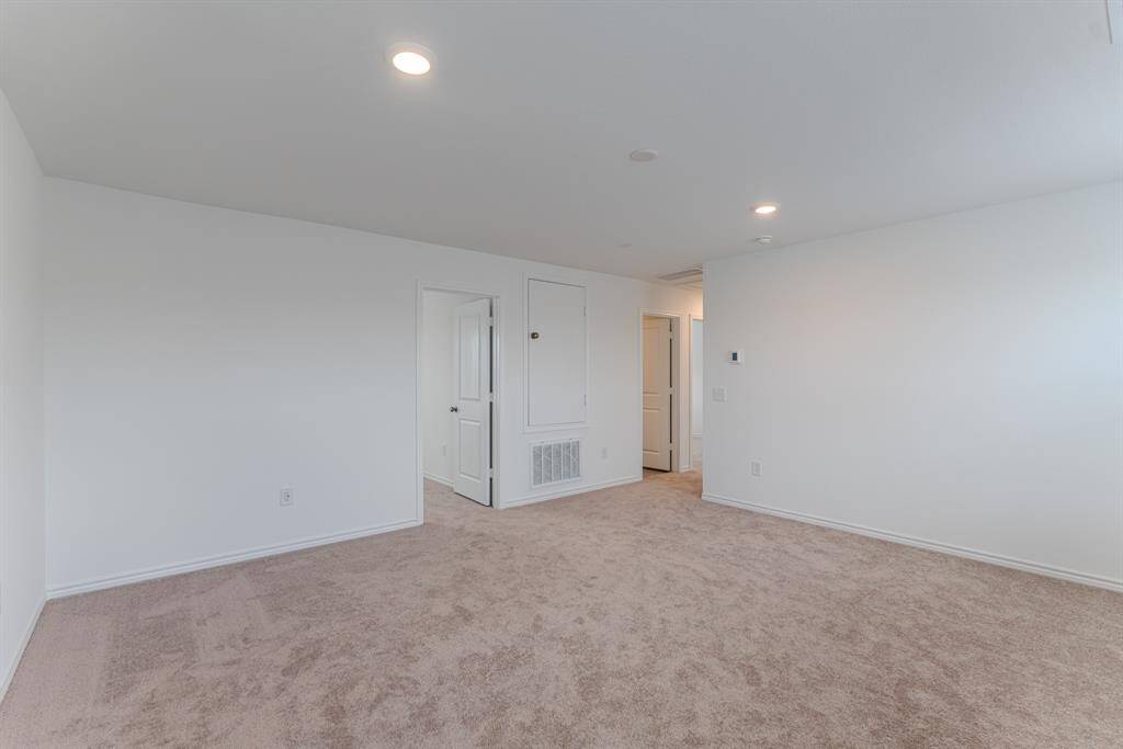 Upstairs media room connecting all three secondary bedrooms