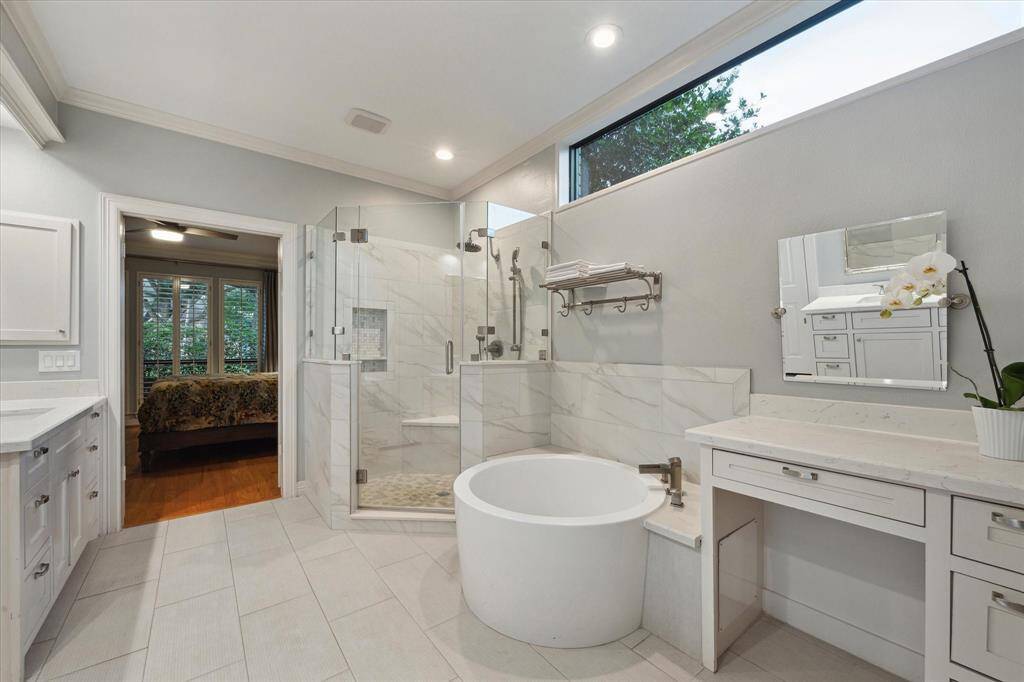 Relax at the end of the day is this sunken, extra deep soaking tub. Note the transom window - it provides great natural light but doesn't compromise privacy.