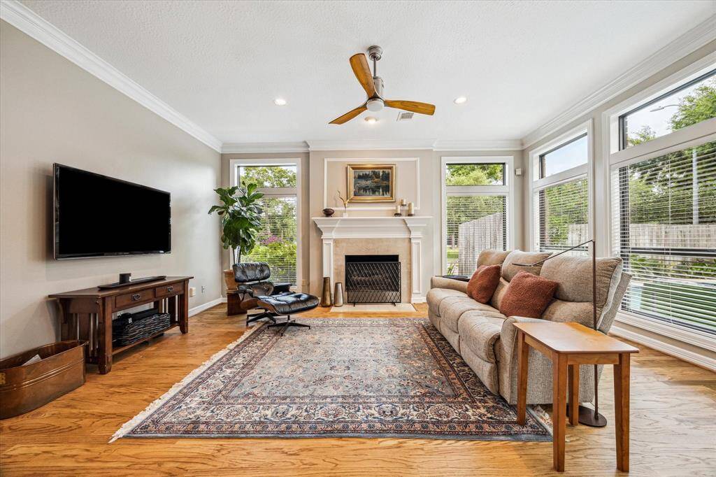 In addition to the updated, double pane windows, this home also offers a cozy fireplace and warm wood flooring.