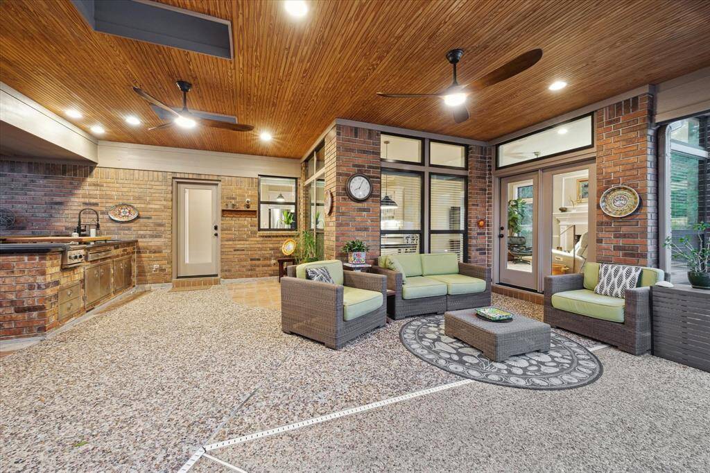Not your average patio, the finishes here are exceptional! There's a beautiful beadboard ceiling, two skylights, two ceiling fans, and plenty of lighting.