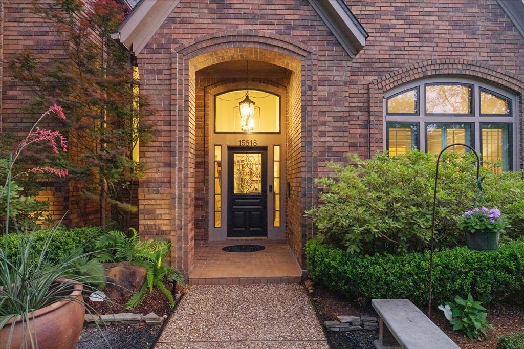 There is a large, fully covered entryway to welcome guests.
