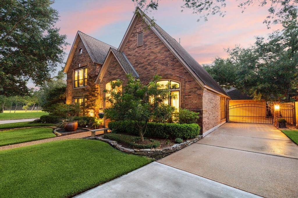 The automatic driveway gate is attractive from the street and it provides extra privacy.
