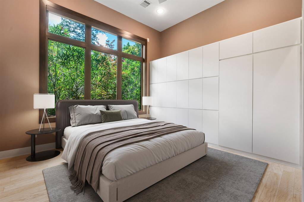 Guest Bedroom Suite could also function as a home study with a wall of built-ins and private desk area.