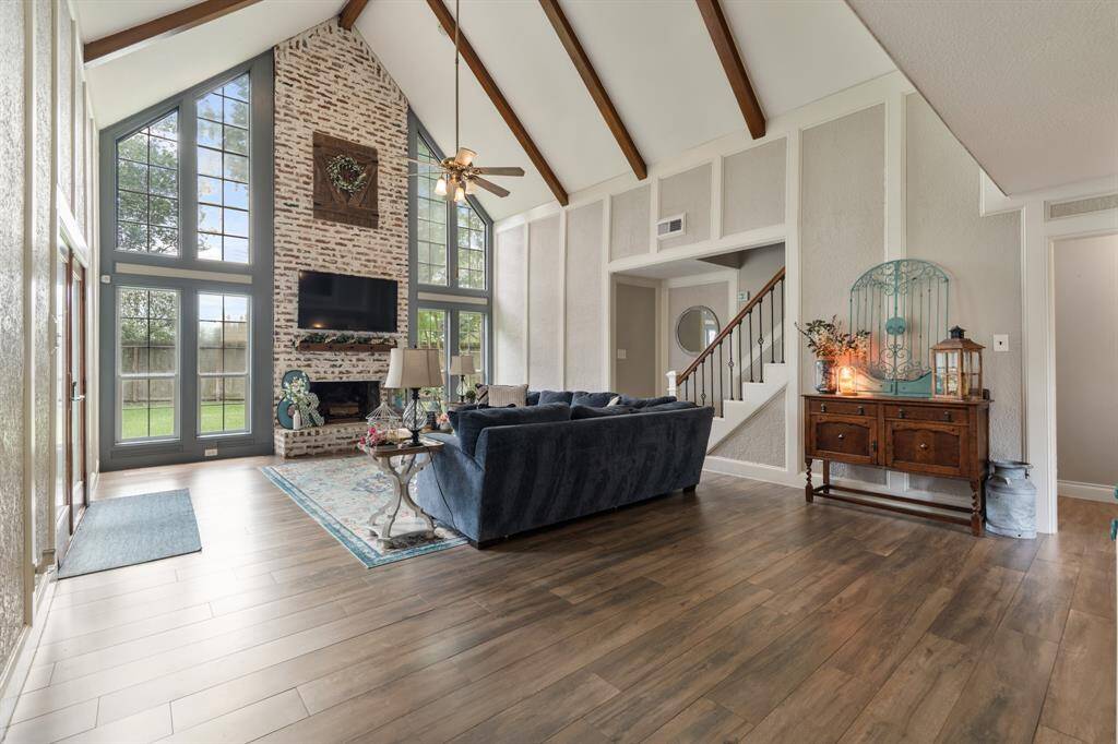This living room goes beyond just an indoor entertaining space and connects to the kitchen and outdoor space!