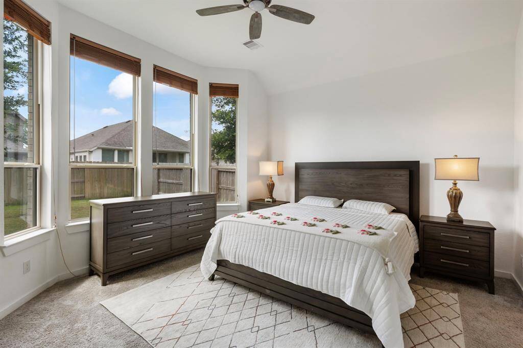 The gorgeous bay windows add a nice touch with view of the backyard.