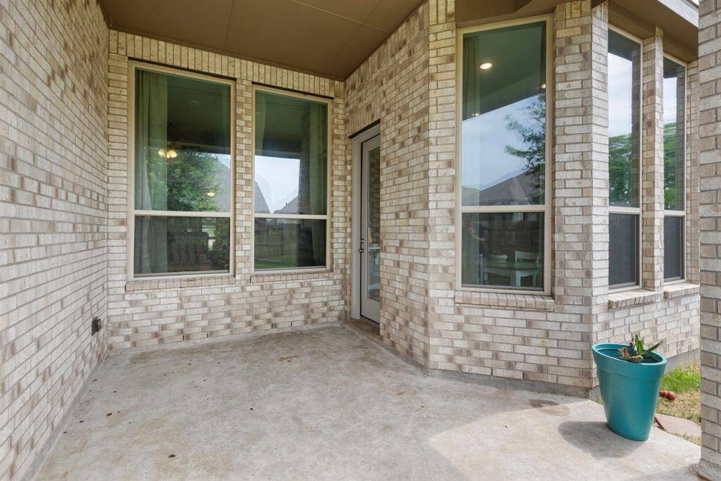 Off the dining area, enjoy the extended covered patio!