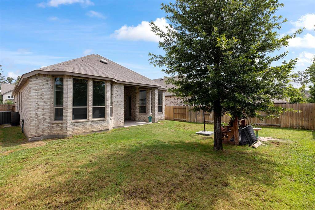 Energy features include an Energy Star reflective roof, High Efficiency Trane HVAC, Insulated/Low-E windows, Batt, blown cellulose, radiant attic Barrier, and on demand tankless hot water heater!