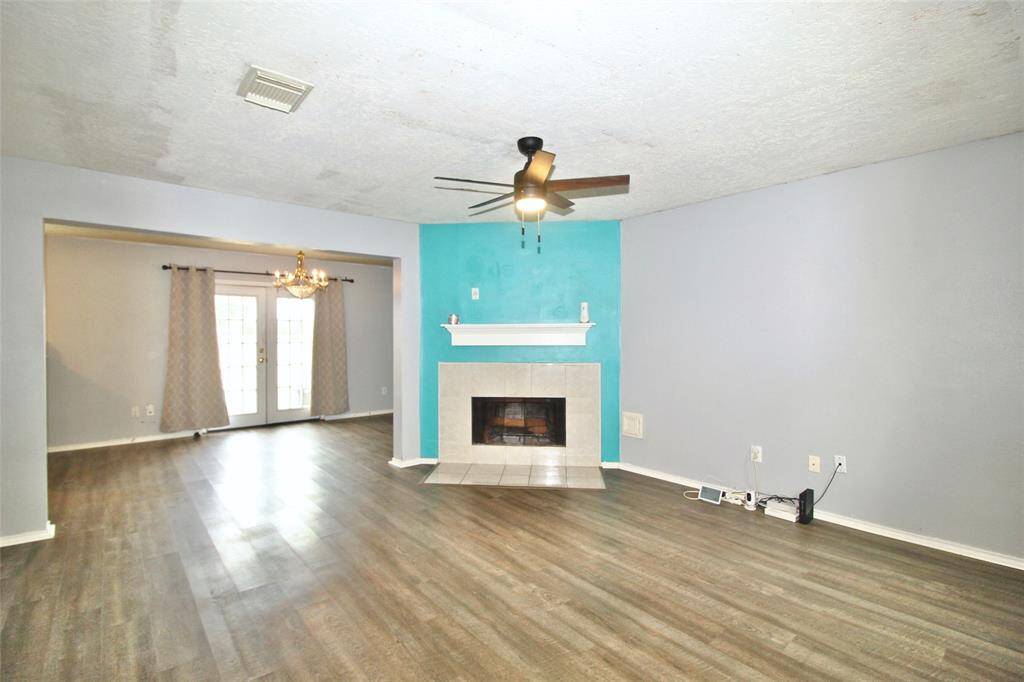 The pop of color stands out in this cozy living room