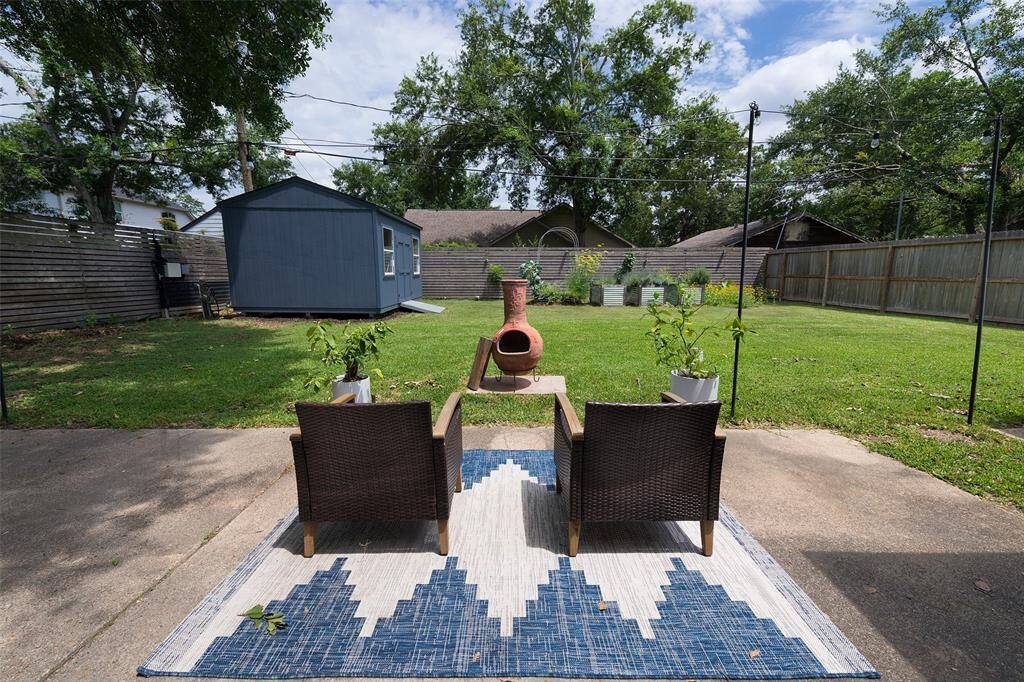 Relax on the patio while enjoying your large backyard with room for anything!