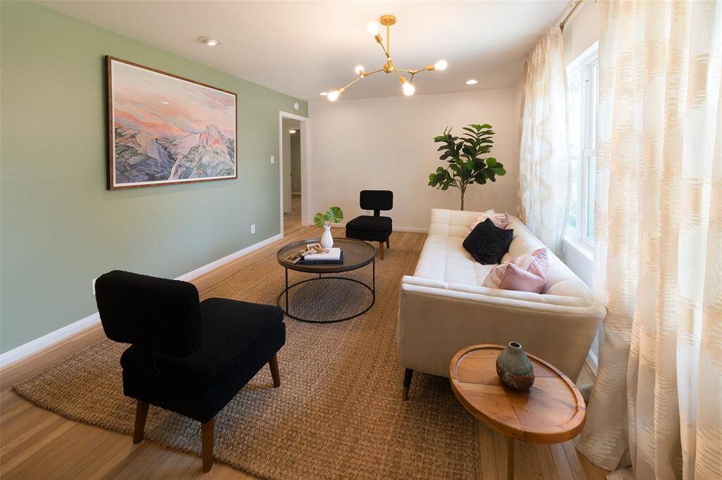 Light and bright living room upon entry.