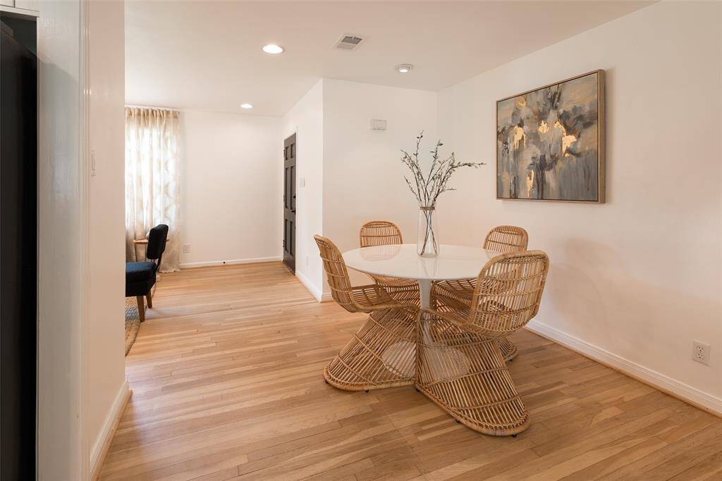 Living room flows in to dining space.