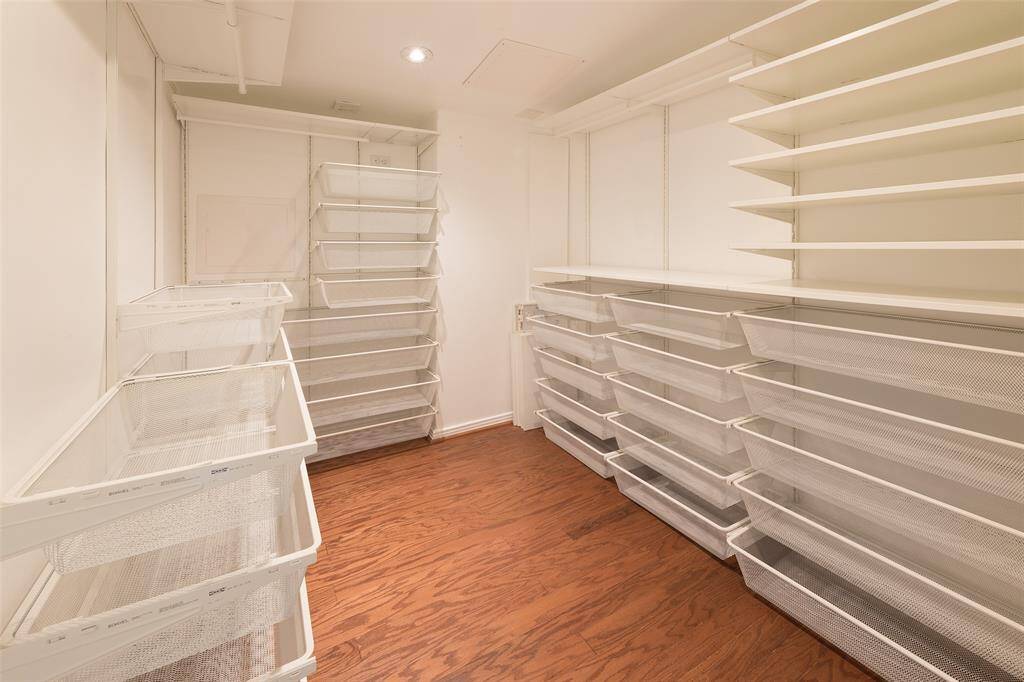 Primary bedroom huge walk-in closet.