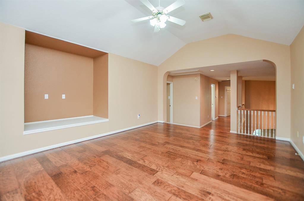 This built-in wall niche looks like a perfect spot for screen and media hookups for movie nights!