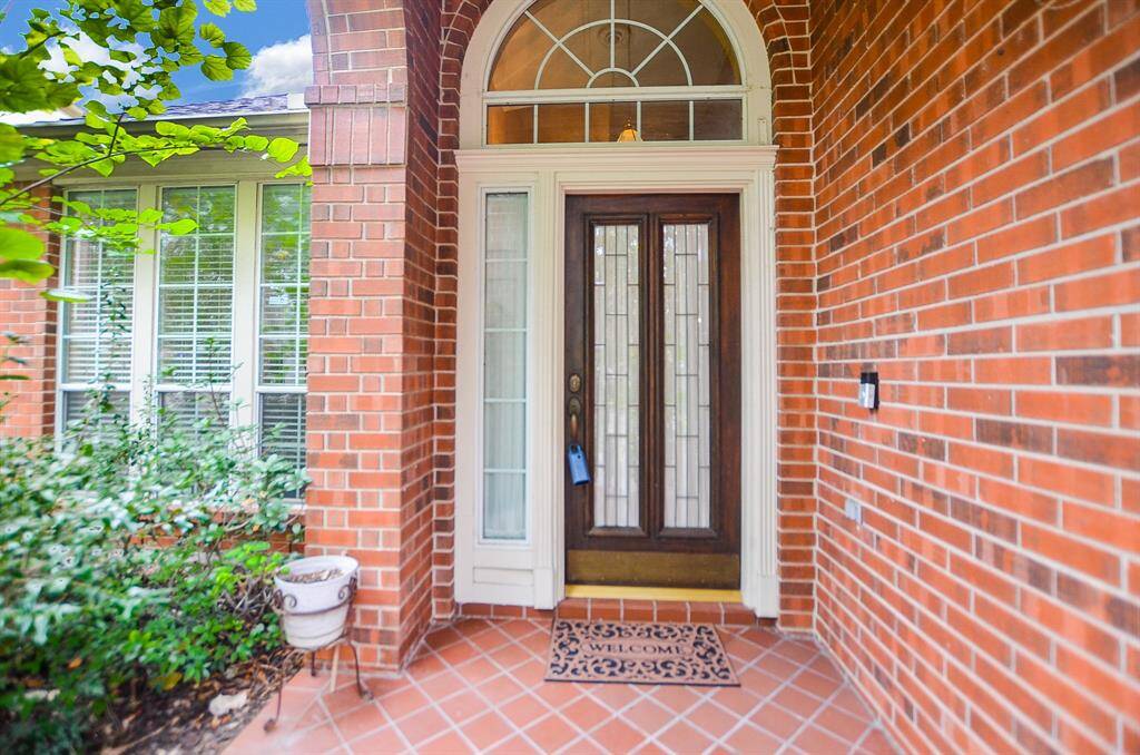 The welcoming, brick lined, covered front entrance affords privacy and unique beauty. Inside, are 4 bedrooms, 2-1/2 baths, all occupying a 9,337 square-foot-lot with 3,177 square-feet of interior living space.