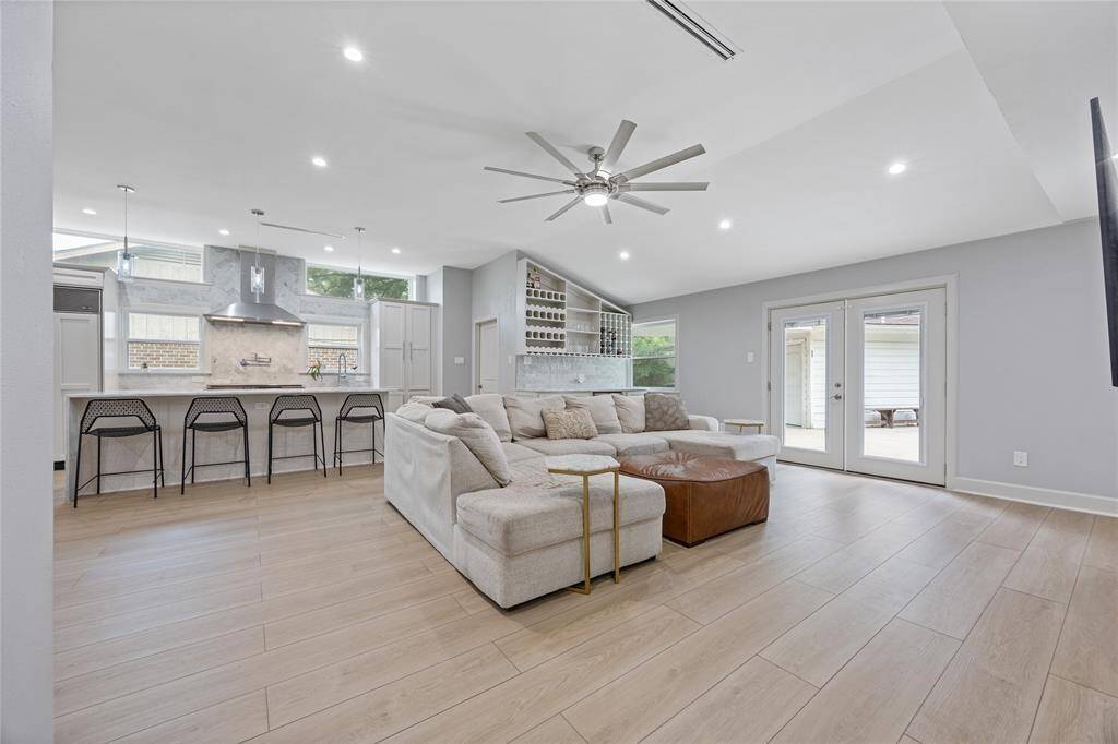 Living Room Layout with Backyard Access and Full Kitchen ViewPerfect for modern lifestyles, this space highlights layout efficiency, openness, and beautiful finishes—ideal for entertaining or everyday living.