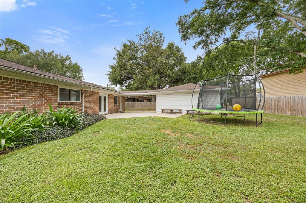Trampoline + Yard SpaceLarge green yard with enough room for a trampoline, sports play, or gardening—tailor it to your lifestyle. This yard is great for kids, pets, or creating your dream outdoor oasis.