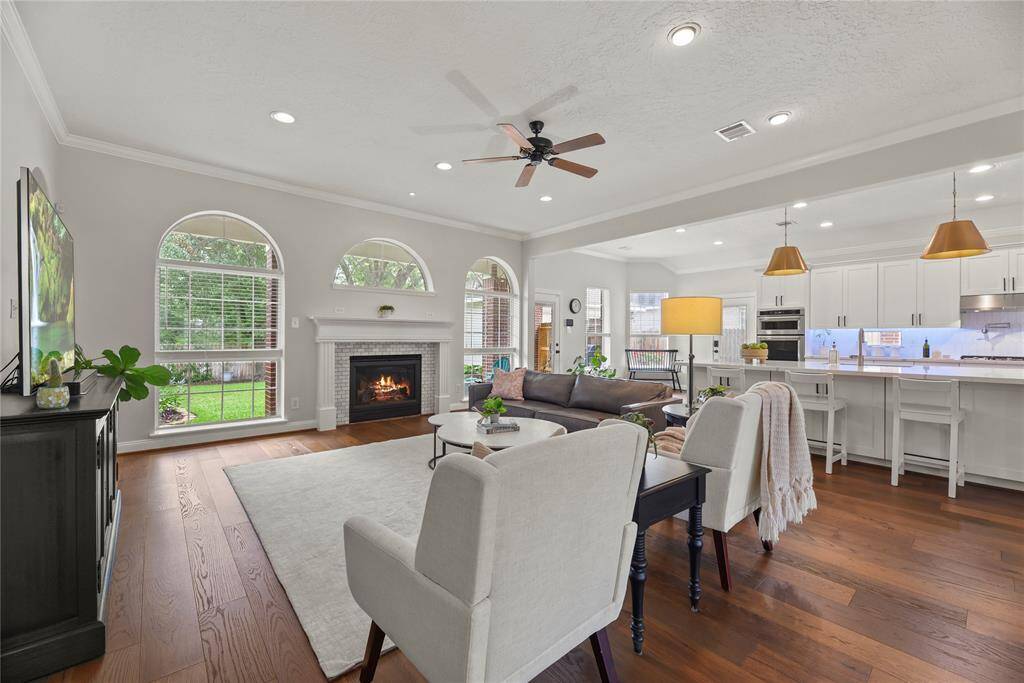 The breakfast bar is a great place to eat a meal or visit with the chef! There is extra storage on the front! Look at the pretty pendant lights!