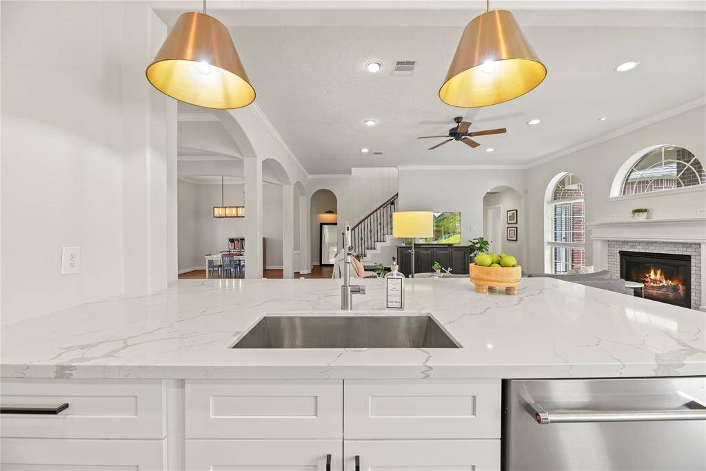 Stylish quartz counters with undermount sink and touchless Moen faucet!