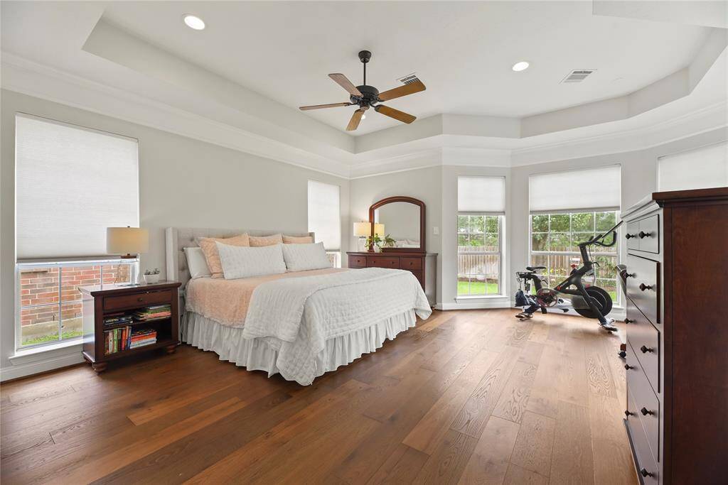 Escape to the owner's retreat! Great natural light! And great privacy if your close the custom window coverings!