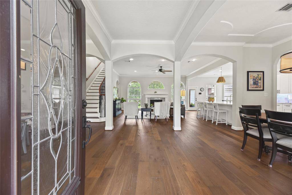 Wide planked engineered wood floors sweep you into this FANTASTICALLY updated home!