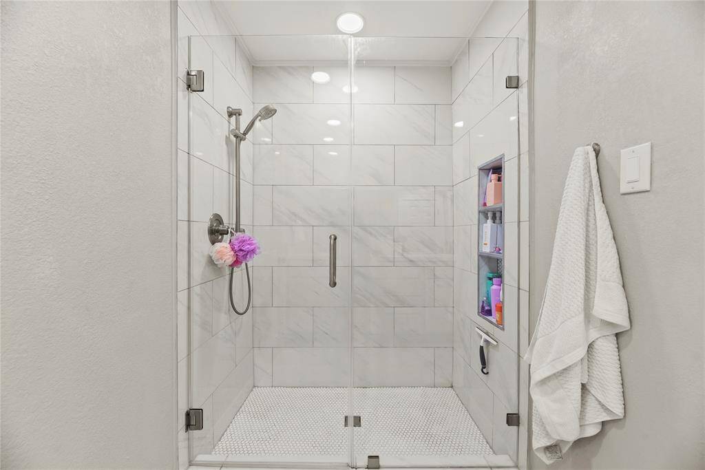and walk-in shower with tile surround and mudset tile!