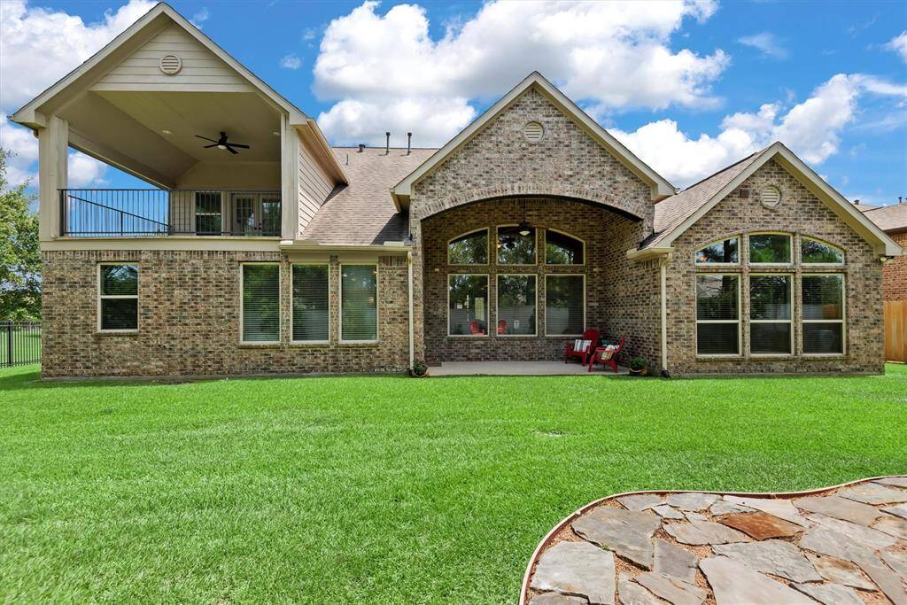 This spacious backyard features lush green grass and plenty of room to bring your vision to life. Whether you're dreaming of a custom pool, playset, garden, or outdoor kitchen, the open layout offers the perfect canvas for creating your ideal outdoor retreat.