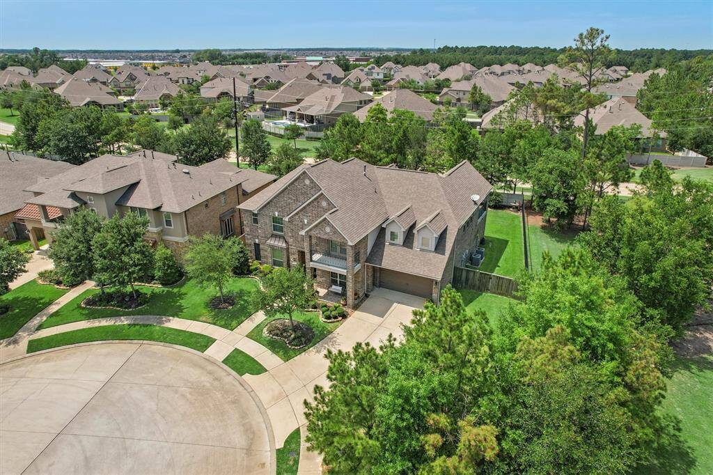 From above you see this sprawling home's character and charm.  2 balconies, one in the front and one in the back, offer elevated views and additional outdoor spaces for entertaining, enjoying morning coffee and lounging in the fresh air.