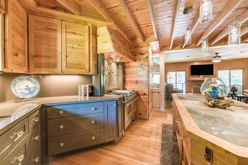 Custom kitchen includes a dumbwaiter to downstairs