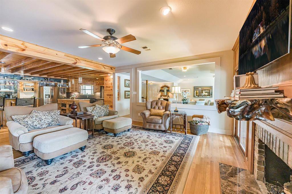 Refinished oak hardwood floors in great room, entry, and kitchen