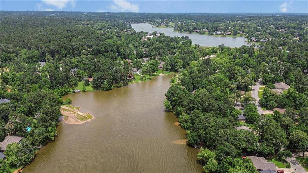 The prestigious golf course resort community of Elkins Lake, where modern elegance meets serene lakeside charm