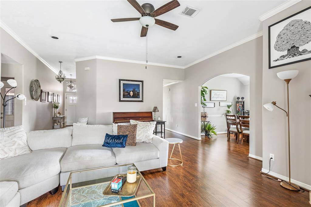 Living Room with Dining Room and Kitchen to the right.