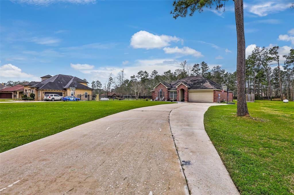 The lot does not hold water near the home, it is 1-2' higher than the neighbors and drains away from the home.