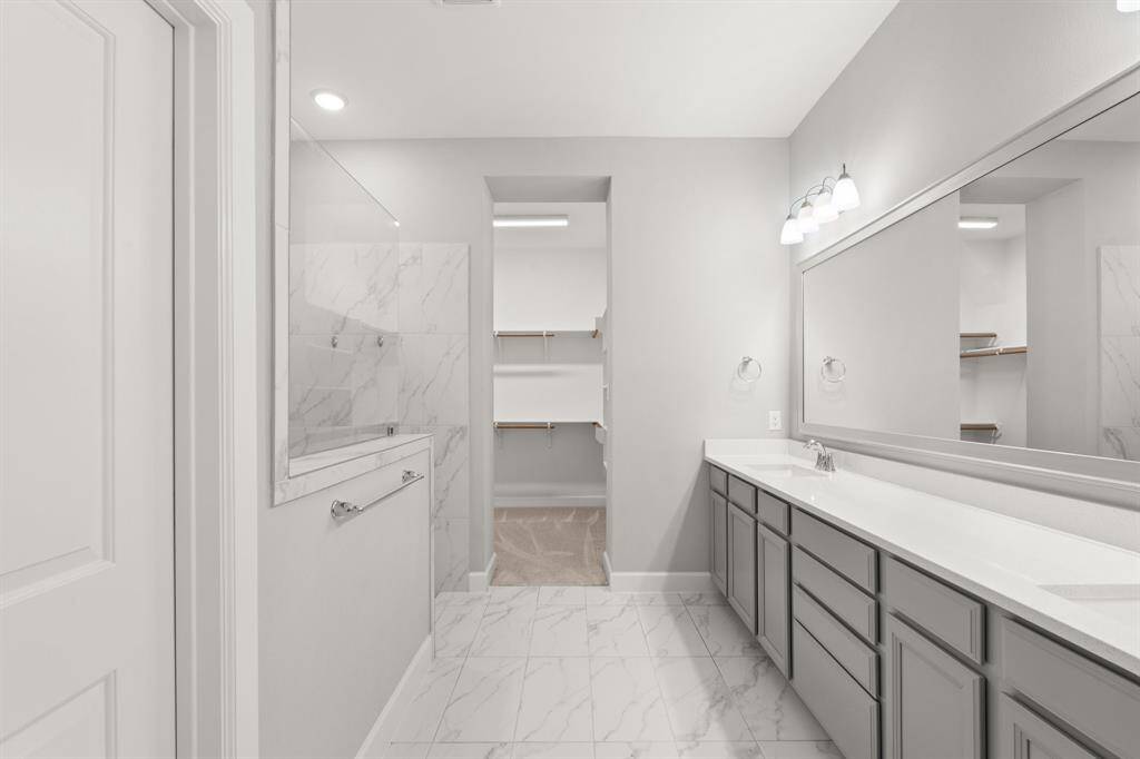 Gorgeous spa-like Primary bathroom with a super-shower.