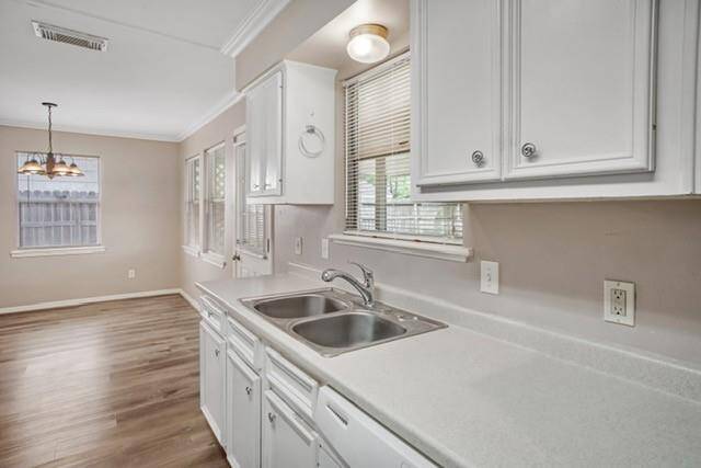 Watch your kiddos play while you tidy up the kitchen!