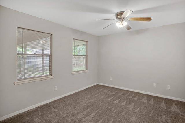 Primary Bedroom looks onto the backyard patio!