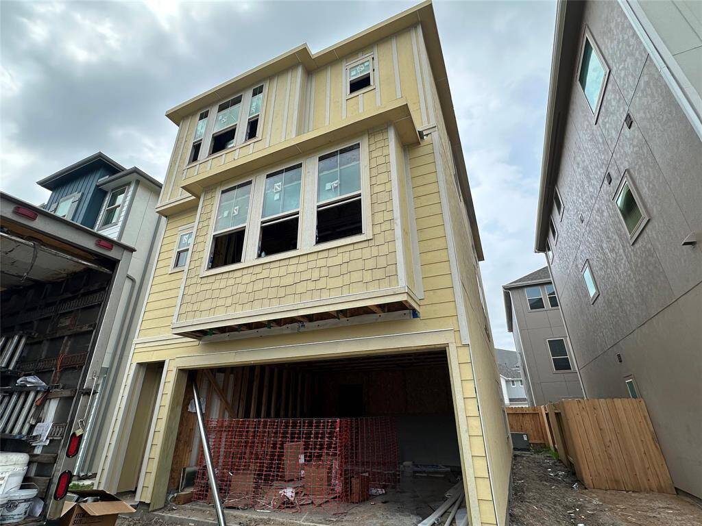 Three-story home with 4 bedrooms, 3.5 baths and 2 car garage