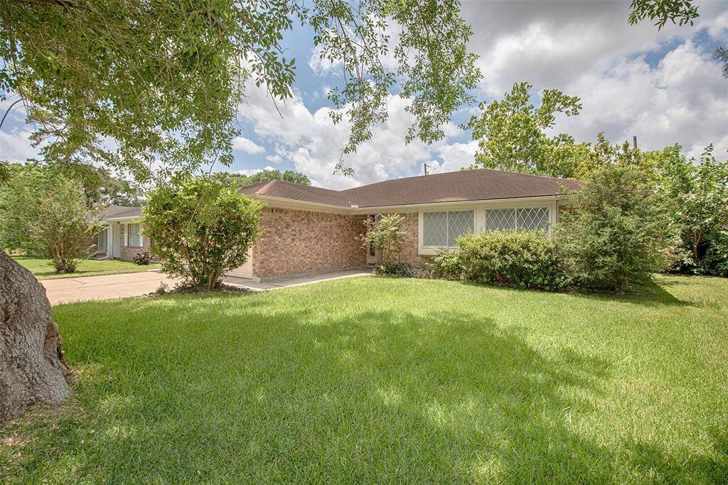 The lush landscaping gives this home great curb appeal.