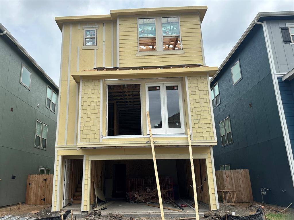 Three-story home with 4 bedrooms, 3.5 baths and 2 car garage