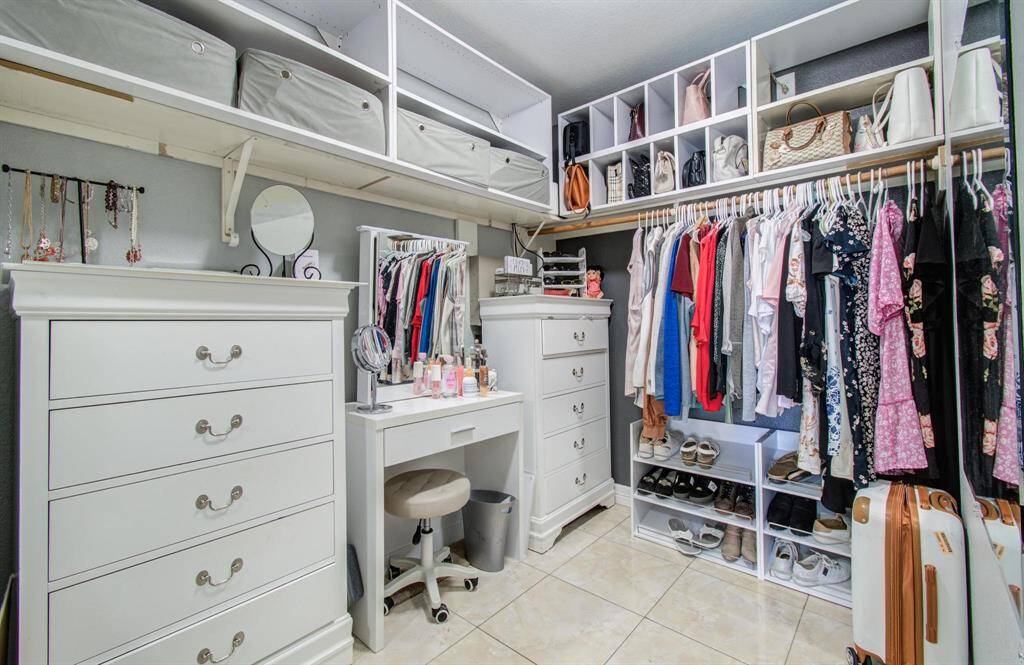 Walk-In Closet at Primary Bedroom