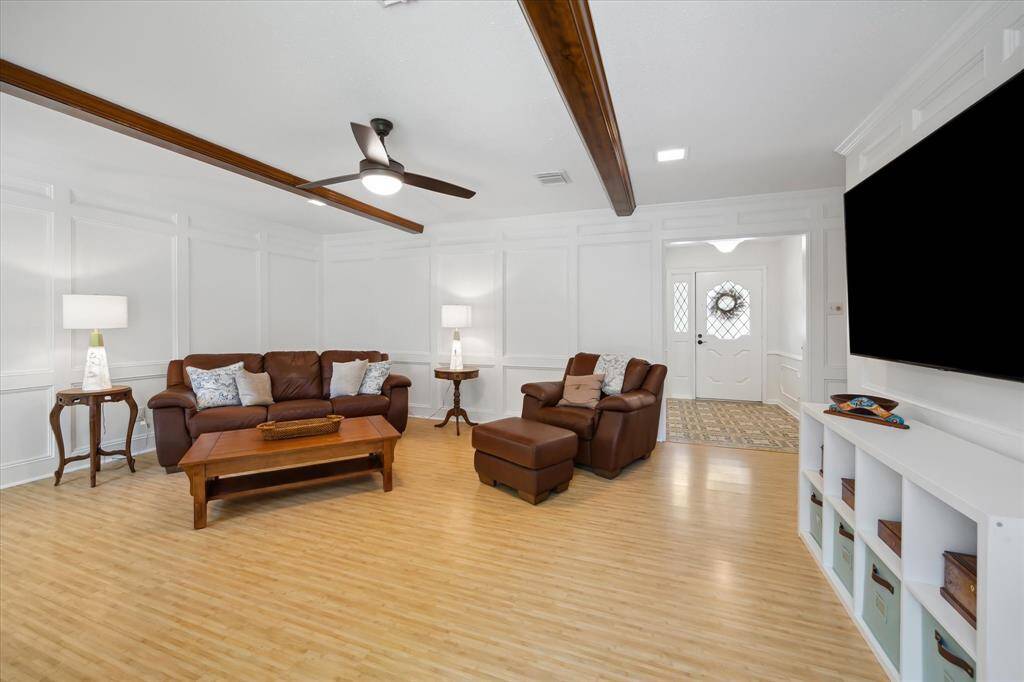 Inviting living room with timeless trim and warm natural light.