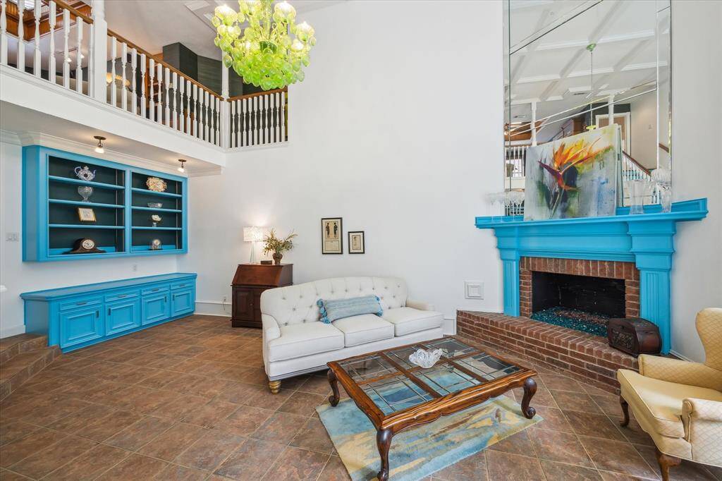 Custom built ins in the family room and a stately fireplace.